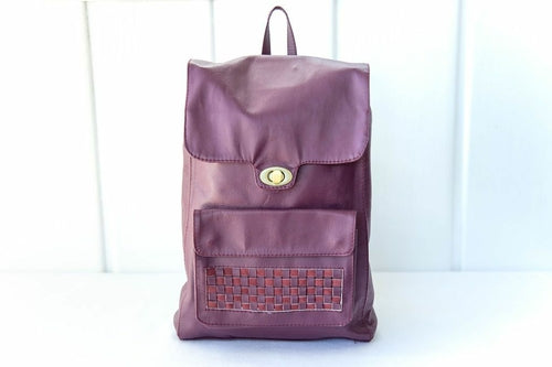 MAGENTA LEATHER BACKPACK WITH WOVEN ACCENT ON FRONT POCKET